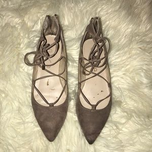 Tan pointed toe flats